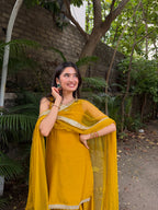 Janasya Women's Yellow Chanderi Silk Embellished Straight Kurta Set